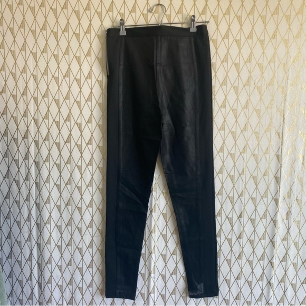 Leather leggings with fabric and zipper detail on side